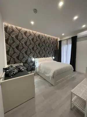 Letto o letti in una camera di Casa Le Formiche Your home in Florence