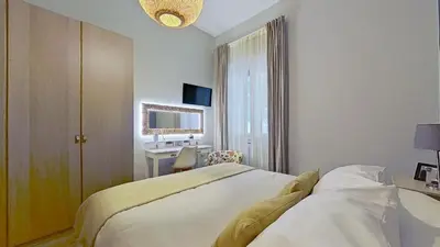 Letto o letti in una camera di Orchidea by Monteverdi