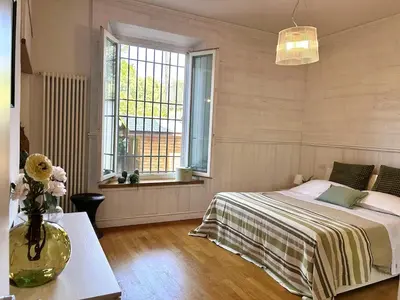 Letto o letti in una camera di Private Oasis Home with outdoor Piazza Libertà