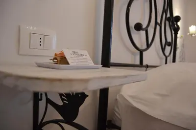 Letto o letti in una camera di B&B Villa Il Poggiolino