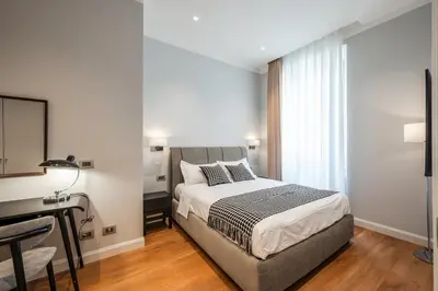 Letto o letti in una camera di Firenze Rentals Deluxe Corso 14 with Duomo View