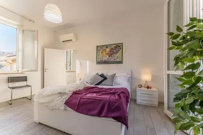 Letto o letti in una camera di Hidden Nest