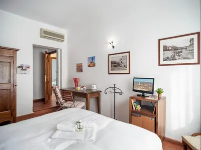 Letto o letti in una camera di Antica Posta