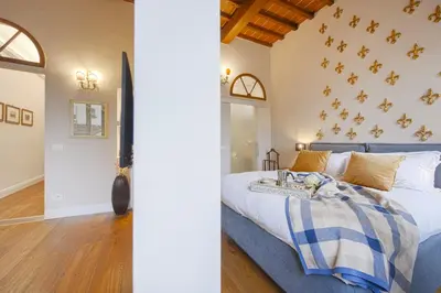 Letto o letti in una camera di Pilastri - Flo Apartments