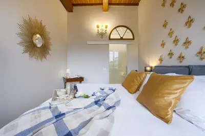 Letto o letti in una camera di Pilastri - Flo Apartments