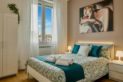 Letto o letti in una camera di A Casa di Cleo
