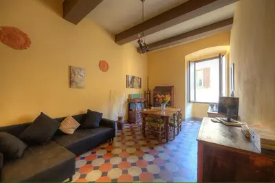 Area soggiorno di Historical building charming apartment