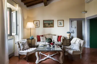 Area soggiorno di Casavilla Rentals by Torre a Cona