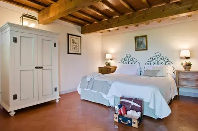 Letto o letti in una camera di Casavilla Rentals by Torre a Cona
