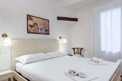 Letto o letti in una camera di Bargello Apartment