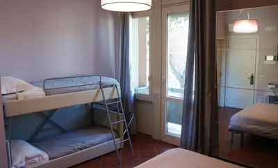 Letto o letti in una camera di B&B Terrazza Belfiore