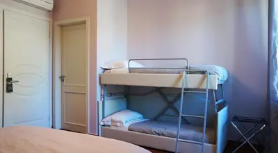 Letto o letti in una camera di B&B Terrazza Belfiore