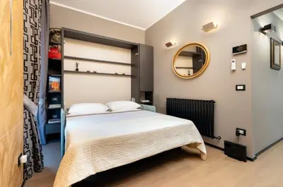 Letto o letti in una camera di Florence Holiday Apartment Ponte Vecchio Glow Suite Jacuzzi