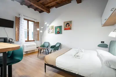 Letto o letti in una camera di GuestHost - Sweet Faenza - San Lorenzo Lovely Nest