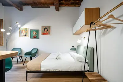 Letto o letti in una camera di GuestHost - Sweet Faenza - San Lorenzo Lovely Nest