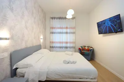 Letto o letti in una camera di Dolce risveglio suite