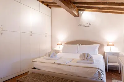 Letto o letti in una camera di Duomo Sky Terrace
