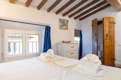 Letto o letti in una camera di Duomo Sky Terrace