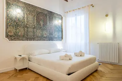 Letto o letti in una camera di Santa Croce Luxury Apartment