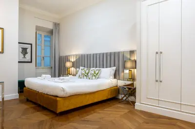 Letto o letti in una camera di Calzaiuoli Private House Silver