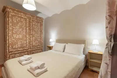 Letto o letti in una camera di San Ambrogio Courtyard in Florence
