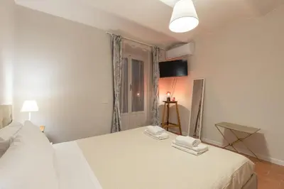 Letto o letti in una camera di San Ambrogio Courtyard in Florence