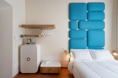 Letto o letti in una camera di Palazzo Graziani
