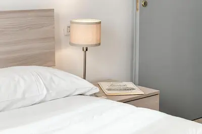 Letto o letti in una camera di Castelnuovo Hub - Sweet Dreams in Florence