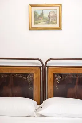 Letto o letti in una camera di Le Grazie Suite 1 in Florence