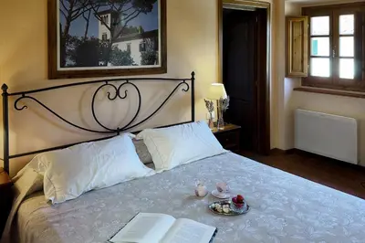 Letto o letti in una camera di Suite Luna at Villa Santa Lucia Nuova