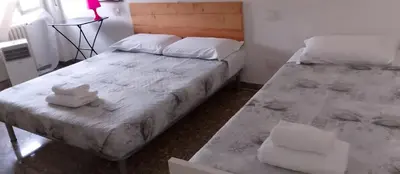Letto o letti in una camera di Corridoni 60 rooms