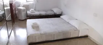Letto o letti in una camera di Corridoni 60 rooms