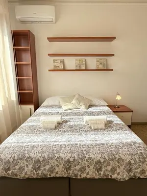 Letto o letti in una camera di Florence San Jacopino Suite