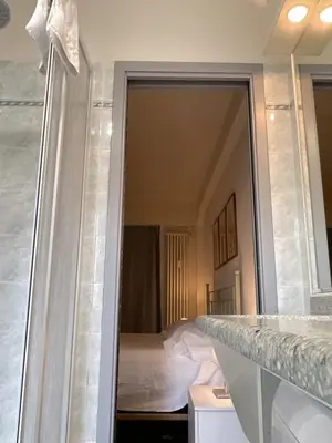 Letto o letti in una camera di Valori