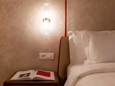 Letto o letti in una camera di Palazzo Doni by Florence Art Apartments