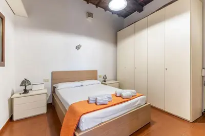 Letto o letti in una camera di GuestHost - Porta Romana Apartment