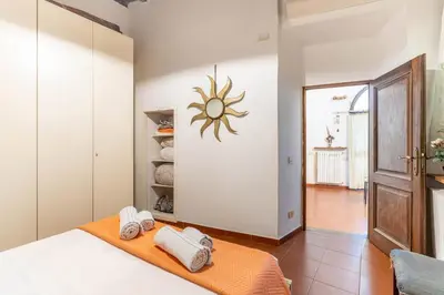 Letto o letti in una camera di GuestHost - Porta Romana Apartment