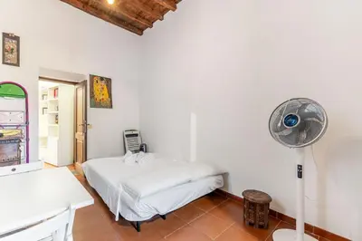 Letto o letti in una camera di GuestHost - Porta Romana Apartment