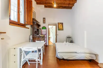 Letto o letti in una camera di GuestHost - Porta Romana Apartment