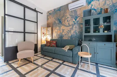 Area soggiorno di Ines Apartment By San Firenze Collection