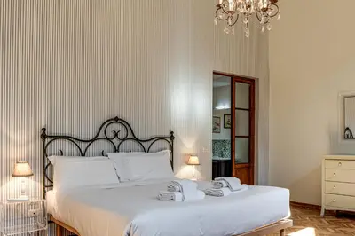 Letto o letti in una camera di Dimora Savelli - Sweet Dreams in Florence