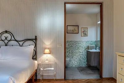 Letto o letti in una camera di Dimora Savelli - Sweet Dreams in Florence