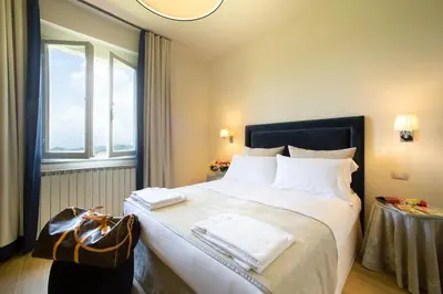 Letto o letti in una camera di Tenuta Torre Rossa Farm & Apartments