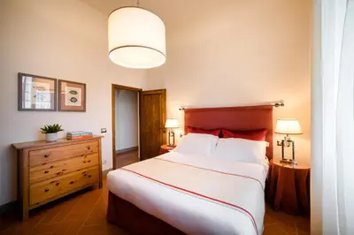 Letto o letti in una camera di Tenuta Torre Rossa Farm & Apartments