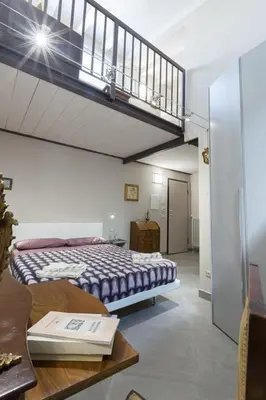 Letto o letti in una camera di Pitti Flats Serragli