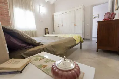 Letto o letti in una camera di Pitti Flats Serragli