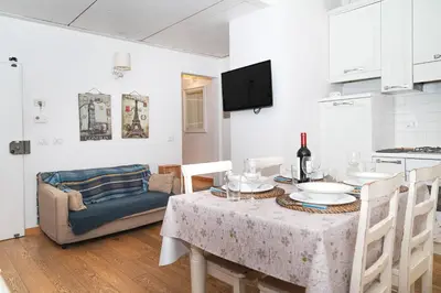 TV o dispositivi per l'intrattenimento presso Borgo Flat 3 Floor View