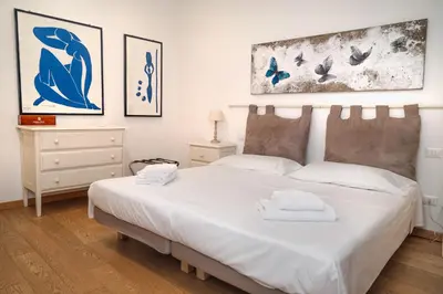 Letto o letti in una camera di Borgo Flat 3 Floor View