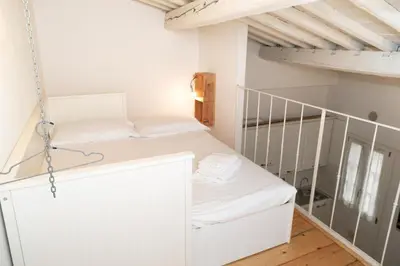Letto o letti in una camera di Borgo Flat 3 Floor View