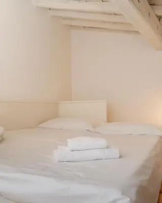 Letto o letti in una camera di Borgo Flat 3 Floor View
